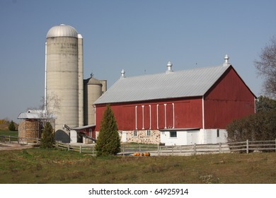 Red Wisconsin Dairy Barn With Concrete Silo