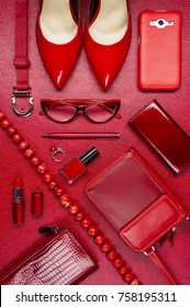 Red Woman Accessories, Jewelry, Clothing, Gadget, Cosmetic And Other Objects On Leather Background, Fashion Industry, Modern Female Concept 