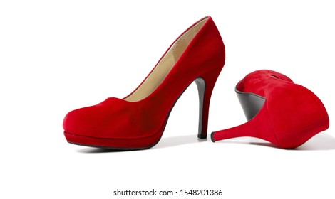 Red Woman Fashion High Heels Shoes Isolated On White Background. Closeup women bright summer footwear. Shopping and Fashion concept. Glamour and luxury ladies accessory. Banner. Selective focus
