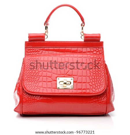 Red women's handbag isolated on white background