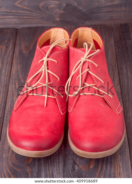 red shoes with black laces
