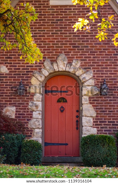 Red Wood Arched Door Surrounded By Stock Photo Edit Now 1139316104