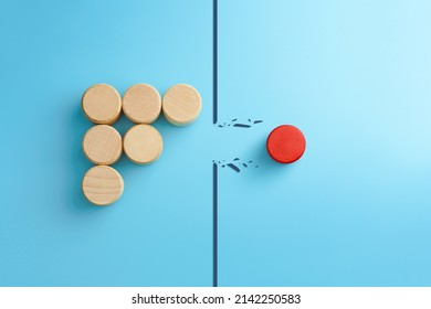 Red Wooden Cube Breaking Through Obstacle On Blue Background, Concept Of Overcoming Barriers, Goal, Target