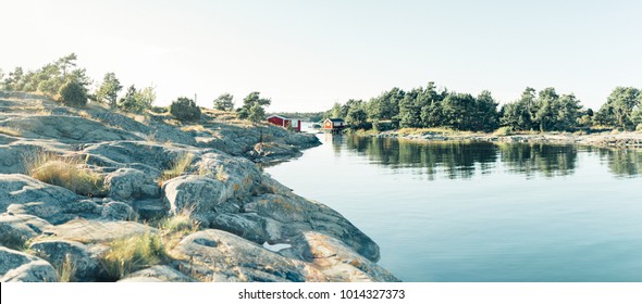 Red Wooden House In Lake Landscape In Sweden, Forest, Panorama In Summer, Norrmalm, Sundsvall, Gothenburg, Gotland