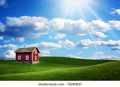 Red 	Wooden House On A Green Field