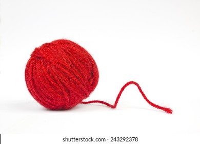 Red wool ball - Shutterstock ID 243292378