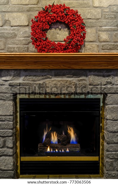 Red Wreath On Mantle Stone Fireplace Stock Photo Edit Now 773063506