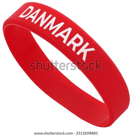 Red wristband or bracelet written Denamark in white letters