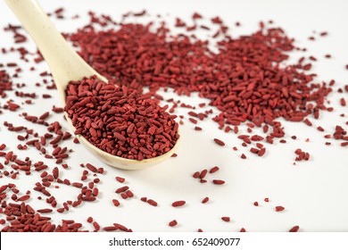 Red Yeast Rice On White Spoon