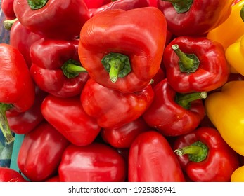 Red And Yellow Bell Peppers Next To It.