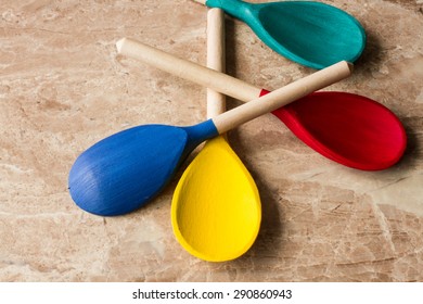 Red Yellow Blue And Green Wooden Spoons