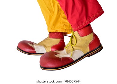 Red And Yellow Clown Shoes Isolated On White Background