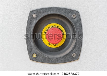 red and yellow emergency stop button of the electric unit