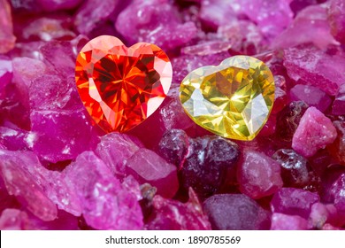 
Red And Yellow Heart Shaped Gems Are Placed Together On Natural Red Garnet Tumbled Stone .
Heart Shape Diamond Is Good Present For Valentine Day