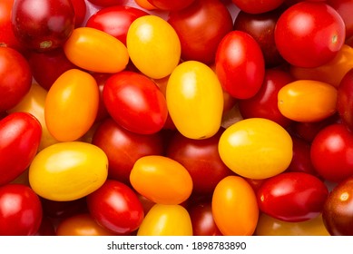 Red, Yellow, Orange Cherry Tomatoes Close up - Powered by Shutterstock