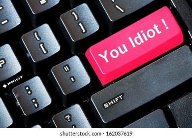 Red YOU IDIOT Button On A Computer Keyboard