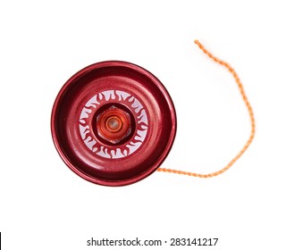 Red yoyo with twine isolated on the white background.