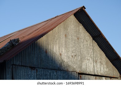 Red Zinc Sheet Roof With Blue Sky
