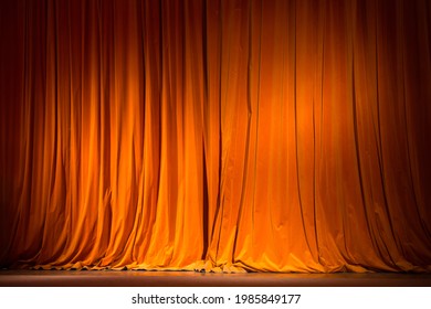 red-brown curtain on the stage with wooden floor and theater backstage, background, texture