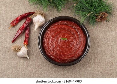 A red-colored spicy sauce made by mixing coarsely cooked rice, rice cake powder, or porridge made of rice or barley with soybean paste powder, red pepper powder, and salt. - Powered by Shutterstock