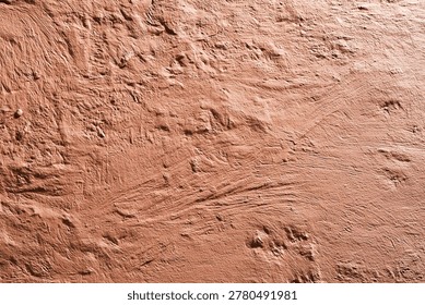 Reddish Clay Soil Texture Background with Rough Uneven Surface
