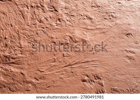Reddish Clay Soil Texture Background with Rough Uneven Surface