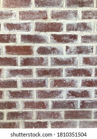 A Reddish And White Exposed Brick Wall, Interior Design Selective Focus.