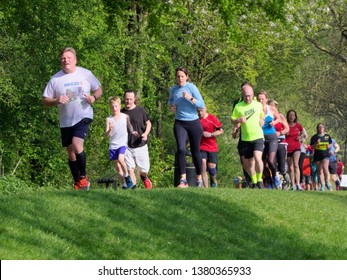 Redditch, UK - April 20 2019: People Of All Ages And Mixed Ability Take Part In Redditch Park Run, Held Each Saturday At Arrow Valley Country Park.