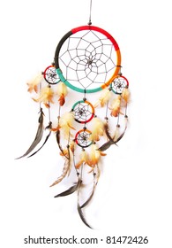 A Red,green And Black Dreamcatcher Isolated In White.