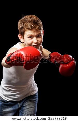 Similar – Image, Stock Photo little boy with boxing gloves on black background