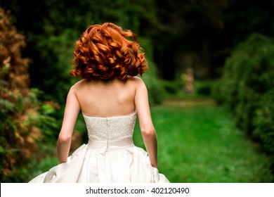 Red-haired bride is running away - Powered by Shutterstock