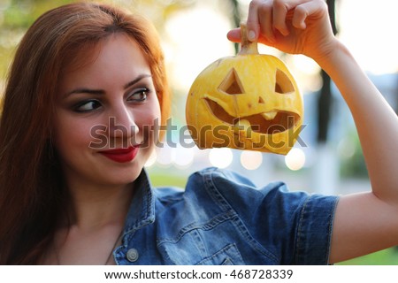 red-haired girl Halloween pumpkin