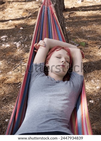 Similar – After this Photocase shock, I have to take a nap in the hammock.