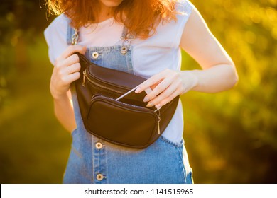 Red-haired Girl With Waist Bag 