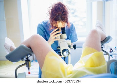 Redhaired Woman Gynecologist Examining Patient Hospital 