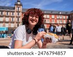 red-haired woman sitting in Madrid