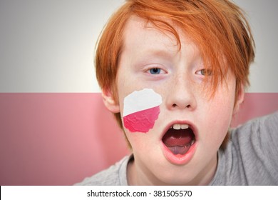 Redhead Fan Boy With Polish Flag Painted On His Face.