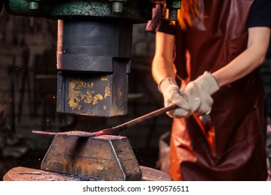 Redhead Ginger Woman Blacksmith Portrait In Workshop