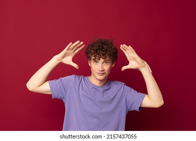 Redhead Guy With Curly Hair Posing Gesture With Hands