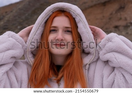 redhead model alone with nature