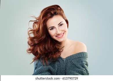 Redhead Woman Fashion Model Smiling. Pretty Girl on Grey Background