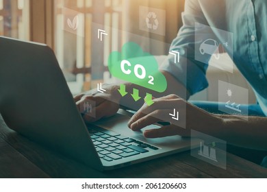 reduce CO2 emission concept with icons, global warming