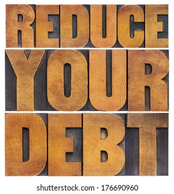 Reduce Your Debt - Financial Concept - Isolated Text In Vintage Letterpress Wood Type