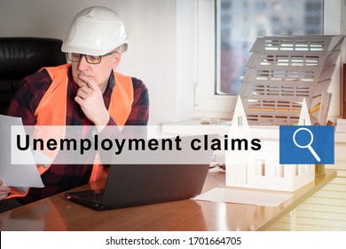 Reduction Of The Construction Company's Staff. A Man In A Construction Helmet Studies Unemployment Claims. Job Loss. Unemployment. Mass Reduction. Bankruptcy Of The Company.