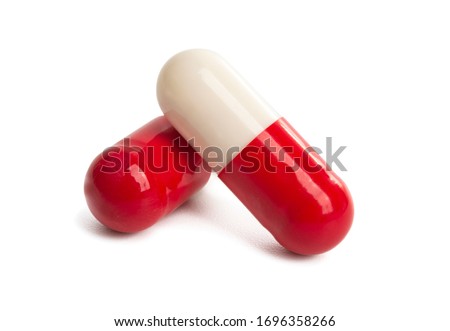 red-white capsules isolated on white background