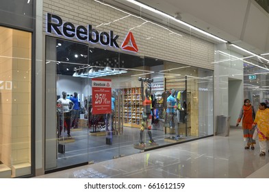 Reebok store Stock & Vectors | Shutterstock