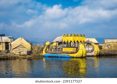 Reed boat on the floating islands of Uros in Lake Titicaca. Peru