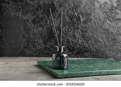 Reed diffuser on dark background