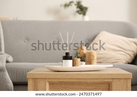 Reed diffuser on table at home