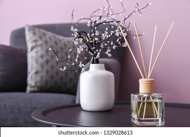 Reed Diffuser On Table In Room